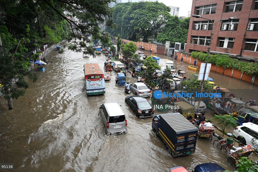 DHAKA, BANGLADESH, SEPTEMBER 20, 2026: Vehicles and passengers navigate waterlogged streets in Dhaka following heavy rainfall in the Bangladeshi capital. Floodwater submerged sections of roads across the city, disrupting traffic and making travel difficult for residents and commuters. Photo by Mamunur Rashid/ JNA Press. (Photo by Mamunur Rashid/JNA Press via Nexpher Images)
