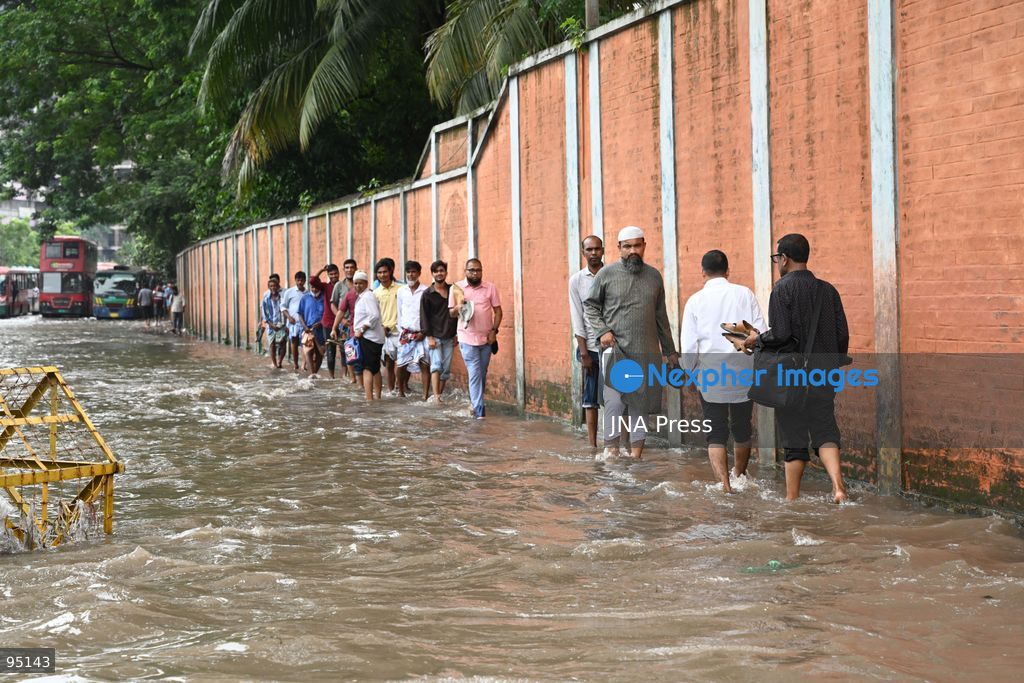 DHAKA, BANGLADESH, SEPTEMBER 20, 2026: Vehicles and passengers navigate waterlogged streets in Dhaka following heavy rainfall in the Bangladeshi capital. Floodwater submerged sections of roads across the city, disrupting traffic and making travel difficult for residents and commuters. Photo by Mamunur Rashid/ JNA Press. (Photo by Mamunur Rashid/JNA Press via Nexpher Images)