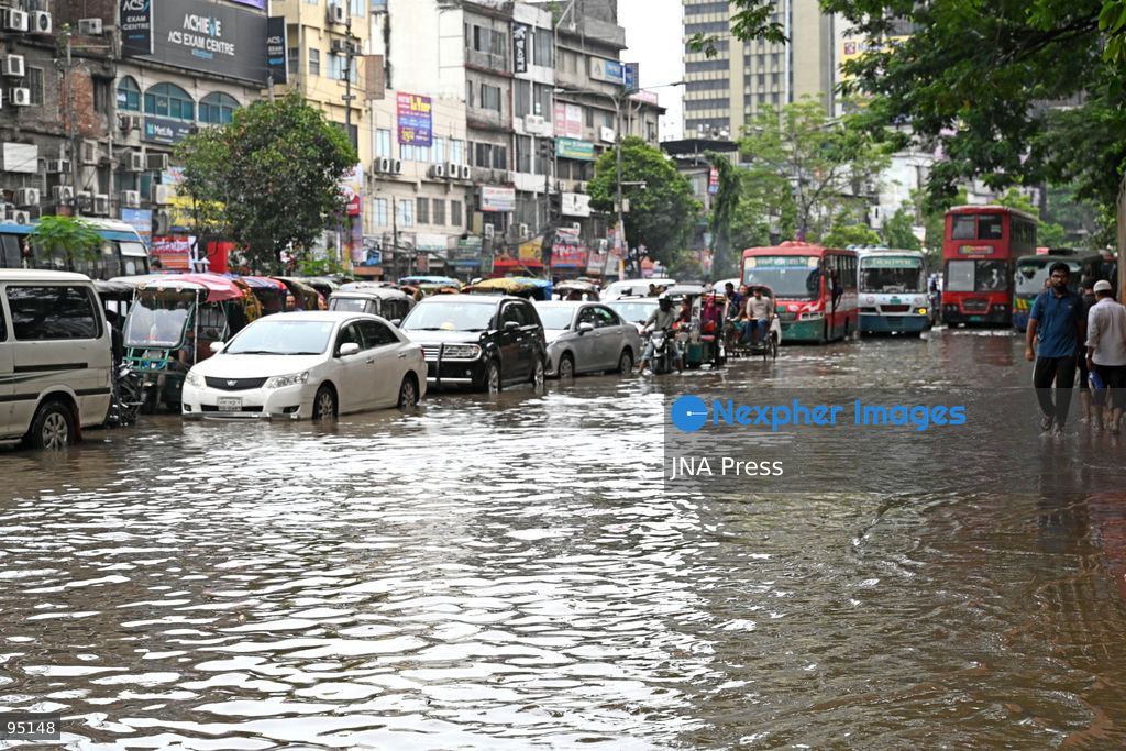 DHAKA, BANGLADESH, SEPTEMBER 20, 2026: Vehicles and passengers navigate waterlogged streets in Dhaka following heavy rainfall in the Bangladeshi capital. Floodwater submerged sections of roads across the city, disrupting traffic and making travel difficult for residents and commuters. Photo by Mamunur Rashid/ JNA Press. (Photo by Mamunur Rashid/JNA Press via Nexpher Images)