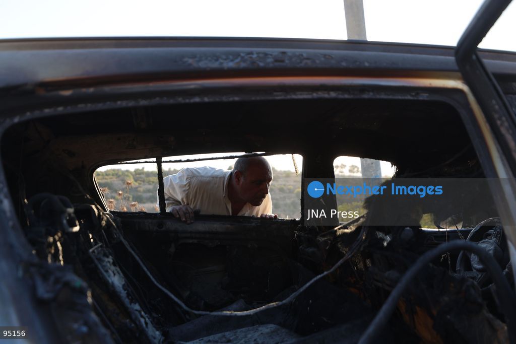 BEIT UMMAR, HEBRON, OCCUPIED WEST BANK, SEPTEMBER 20, 2026: Burned vehicles are seen following an attack by Israeli settlers in the town of Beit Ummar, north of Hebron. According to local sources, a Palestinian woman was injured and five vehicles were set on fire during the attack. Photo by Mosab Shawer / JNA Press. (Photo by Mosab shawer/JNA Press via Nexpher Images)