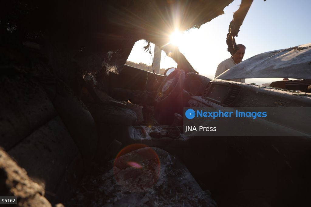 BEIT UMMAR, HEBRON, OCCUPIED WEST BANK, SEPTEMBER 20, 2026: Burned vehicles are seen following an attack by Israeli settlers in the town of Beit Ummar, north of Hebron. According to local sources, a Palestinian woman was injured and five vehicles were set on fire during the attack. Photo by Mosab Shawer / JNA Press. (Photo by Mosab shawer/JNA Press via Nexpher Images)