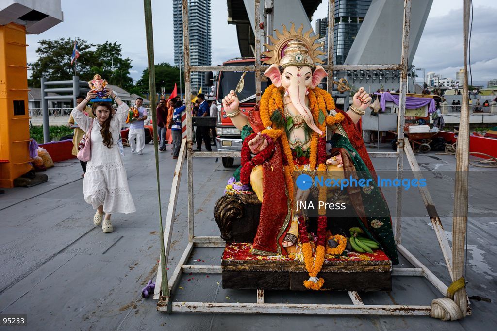 BANGKOK, THAILAND, SEPTEMBER 20, 2026: Hindu devotees worship a statue of Lord Ganesha during Ganesh Chaturthi celebrations near Bhumibol Bridge in Bangkok. The Hindu festival honors Ganesha, the deity associated with wisdom, prosperity and the removal of obstacles, and is observed with prayers, offerings and religious ceremonies. Photo by Watsawat Koktabtim / JNA Press. (Photo by Watsawat Koktabtim/JNA Press via Nexpher Images)