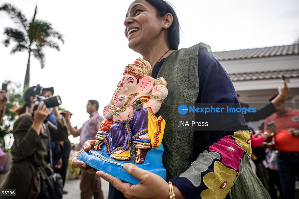 BANGKOK, THAILAND, SEPTEMBER 20, 2026: Hindu devotees worship a statue of Lord Ganesha during Ganesh Chaturthi celebrations near Bhumibol Bridge in Bangkok. The Hindu festival honors Ganesha, the deity associated with wisdom, prosperity and the removal of obstacles, and is observed with prayers, offerings and religious ceremonies. Photo by Watsawat Koktabtim / JNA Press. (Photo by Watsawat Koktabtim/JNA Press via Nexpher Images)
