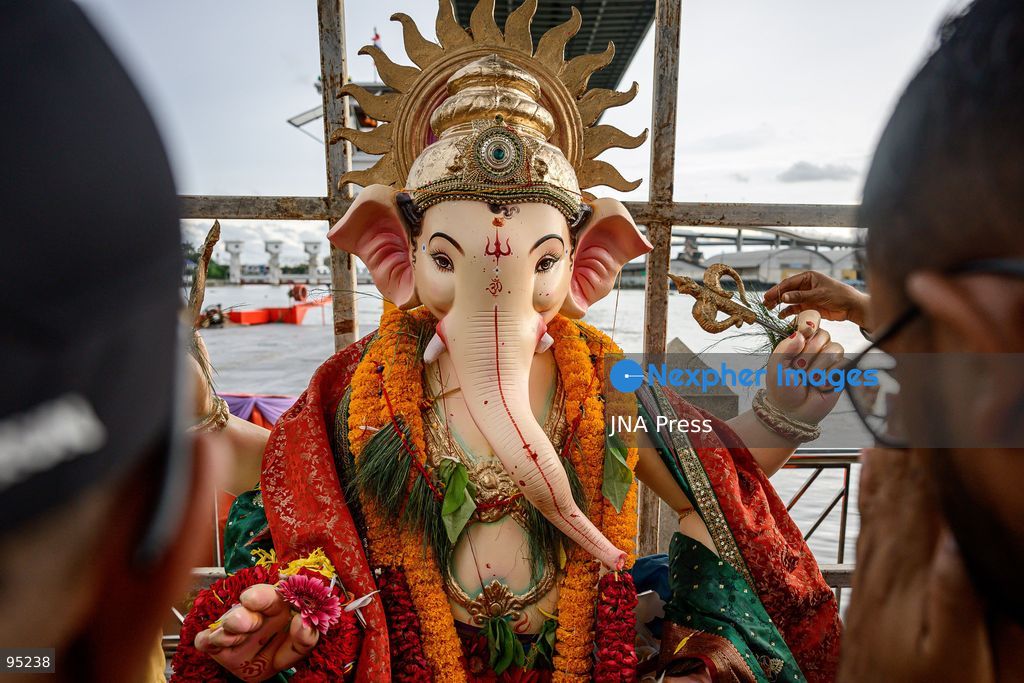 BANGKOK, THAILAND, SEPTEMBER 20, 2026: Hindu devotees worship a statue of Lord Ganesha during Ganesh Chaturthi celebrations near Bhumibol Bridge in Bangkok. The Hindu festival honors Ganesha, the deity associated with wisdom, prosperity and the removal of obstacles, and is observed with prayers, offerings and religious ceremonies. Photo by Watsawat Koktabtim / JNA Press. (Photo by Watsawat Koktabtim/JNA Press via Nexpher Images)