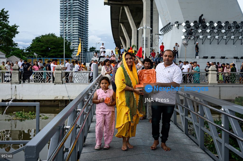 BANGKOK, THAILAND, SEPTEMBER 20, 2026: Hindu devotees worship a statue of Lord Ganesha during Ganesh Chaturthi celebrations near Bhumibol Bridge in Bangkok. The Hindu festival honors Ganesha, the deity associated with wisdom, prosperity and the removal of obstacles, and is observed with prayers, offerings and religious ceremonies. Photo by Watsawat Koktabtim / JNA Press. (Photo by Watsawat Koktabtim/JNA Press via Nexpher Images)