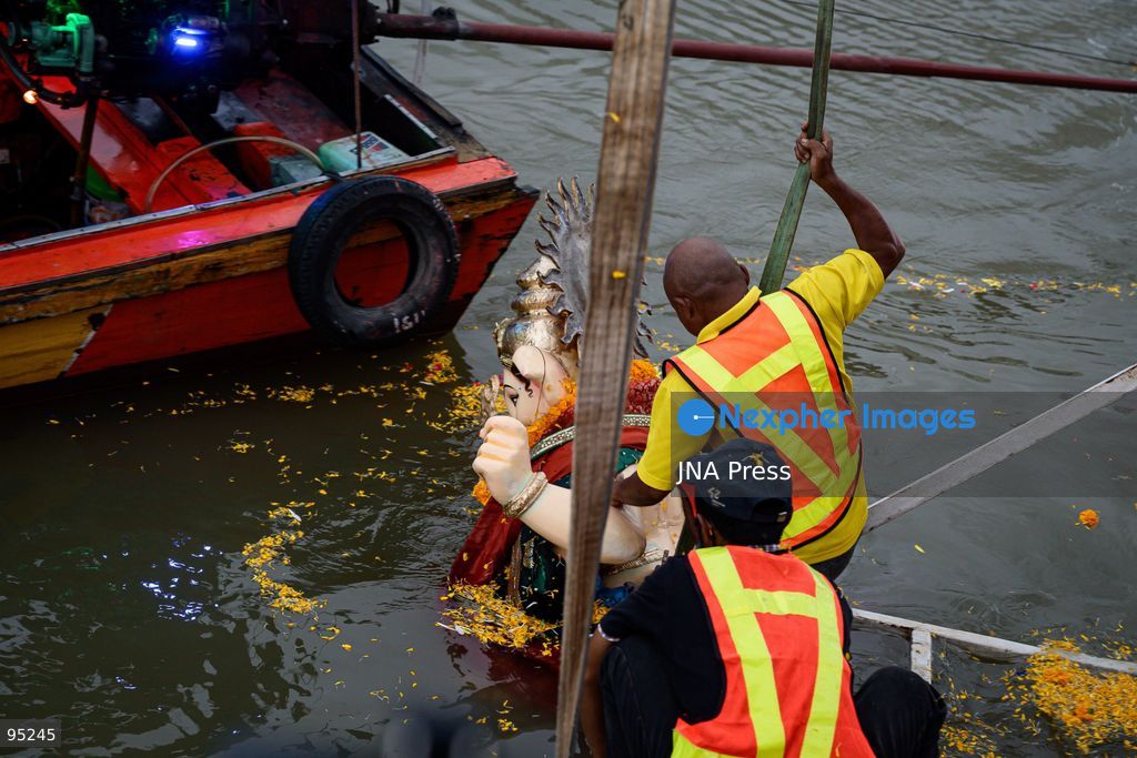 BANGKOK, THAILAND, SEPTEMBER 20, 2026: Hindu devotees worship a statue of Lord Ganesha during Ganesh Chaturthi celebrations near Bhumibol Bridge in Bangkok. The Hindu festival honors Ganesha, the deity associated with wisdom, prosperity and the removal of obstacles, and is observed with prayers, offerings and religious ceremonies. Photo by Watsawat Koktabtim / JNA Press. (Photo by Watsawat Koktabtim/JNA Press via Nexpher Images)