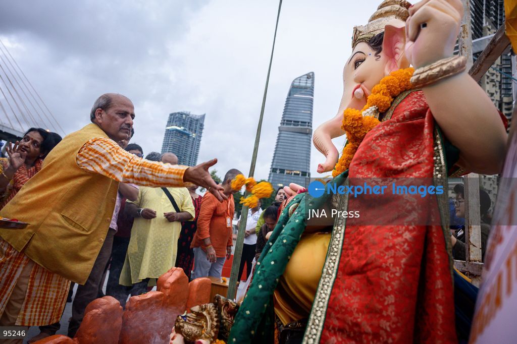 BANGKOK, THAILAND, SEPTEMBER 20, 2026: Hindu devotees worship a statue of Lord Ganesha during Ganesh Chaturthi celebrations near Bhumibol Bridge in Bangkok. The Hindu festival honors Ganesha, the deity associated with wisdom, prosperity and the removal of obstacles, and is observed with prayers, offerings and religious ceremonies. Photo by Watsawat Koktabtim / JNA Press. (Photo by Watsawat Koktabtim/JNA Press via Nexpher Images)