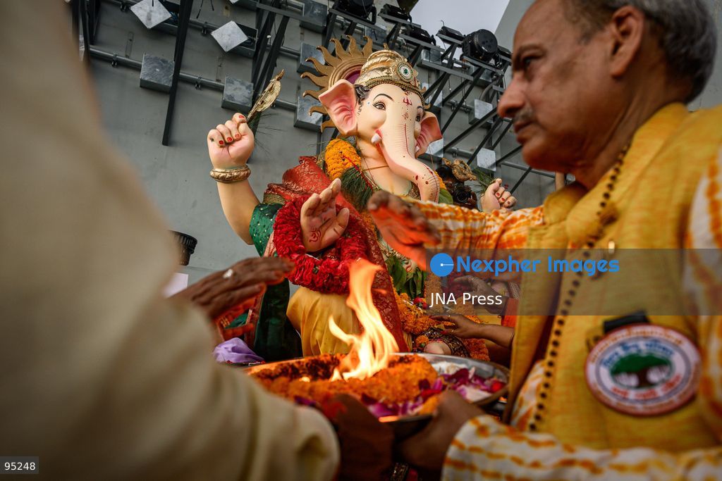 BANGKOK, THAILAND, SEPTEMBER 20, 2026: Hindu devotees worship a statue of Lord Ganesha during Ganesh Chaturthi celebrations near Bhumibol Bridge in Bangkok. The Hindu festival honors Ganesha, the deity associated with wisdom, prosperity and the removal of obstacles, and is observed with prayers, offerings and religious ceremonies. Photo by Watsawat Koktabtim / JNA Press. (Photo by Watsawat Koktabtim/JNA Press via Nexpher Images)