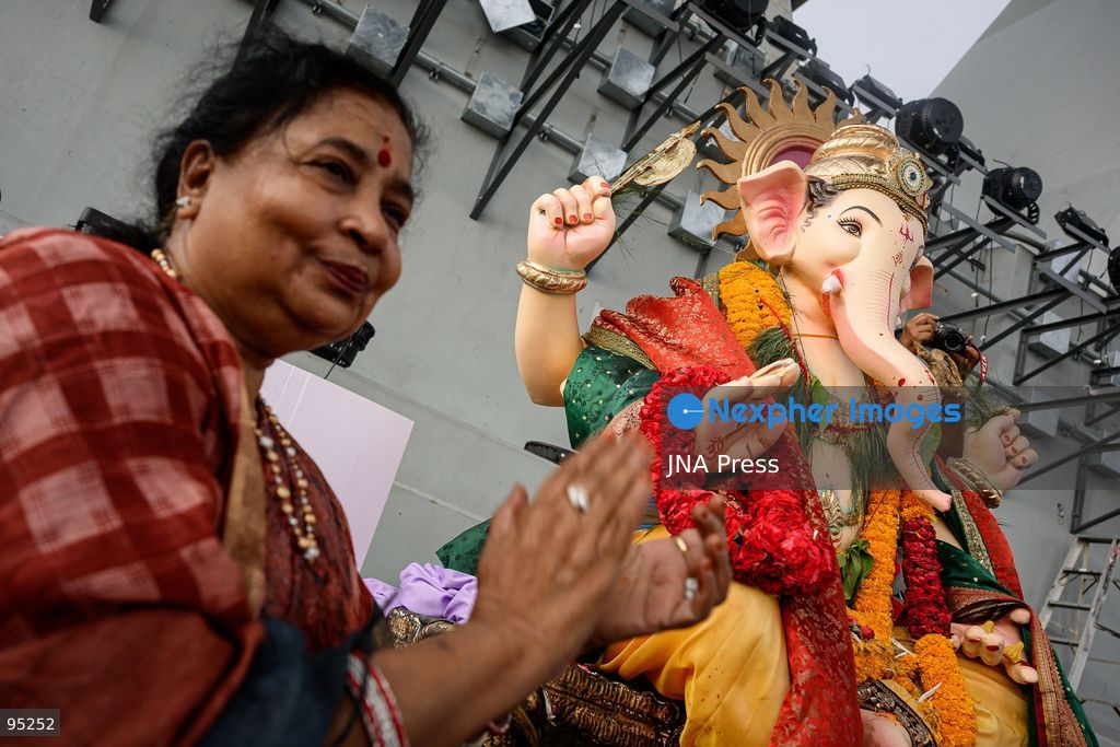 BANGKOK, THAILAND, SEPTEMBER 20, 2026: Hindu devotees worship a statue of Lord Ganesha during Ganesh Chaturthi celebrations near Bhumibol Bridge in Bangkok. The Hindu festival honors Ganesha, the deity associated with wisdom, prosperity and the removal of obstacles, and is observed with prayers, offerings and religious ceremonies. Photo by Watsawat Koktabtim / JNA Press. (Photo by Watsawat Koktabtim/JNA Press via Nexpher Images)