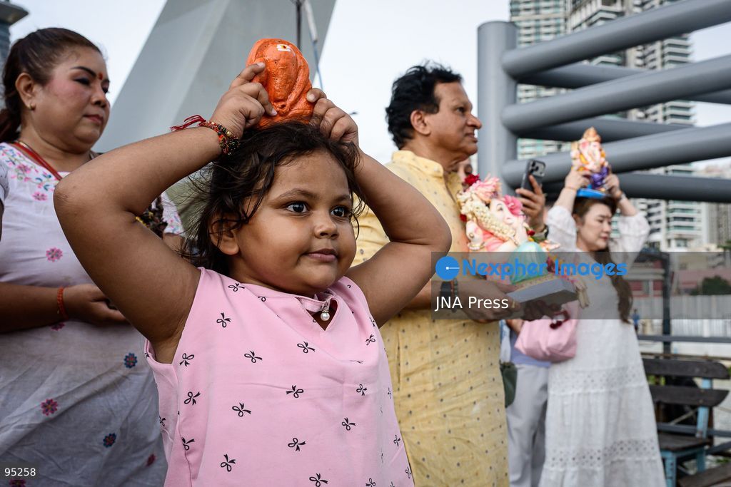 BANGKOK, THAILAND, SEPTEMBER 20, 2026: Hindu devotees worship a statue of Lord Ganesha during Ganesh Chaturthi celebrations near Bhumibol Bridge in Bangkok. The Hindu festival honors Ganesha, the deity associated with wisdom, prosperity and the removal of obstacles, and is observed with prayers, offerings and religious ceremonies. Photo by Watsawat Koktabtim / JNA Press. (Photo by Watsawat Koktabtim/JNA Press via Nexpher Images)