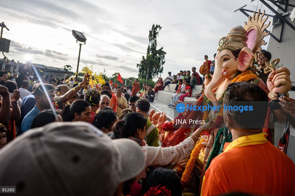 BANGKOK, THAILAND, SEPTEMBER 20, 2026: Hindu devotees worship a statue of Lord Ganesha during Ganesh Chaturthi celebrations near Bhumibol Bridge in Bangkok. The Hindu festival honors Ganesha, the deity associated with wisdom, prosperity and the removal of obstacles, and is observed with prayers, offerings and religious ceremonies. Photo by Watsawat Koktabtim / JNA Press. (Photo by Watsawat Koktabtim/JNA Press via Nexpher Images)