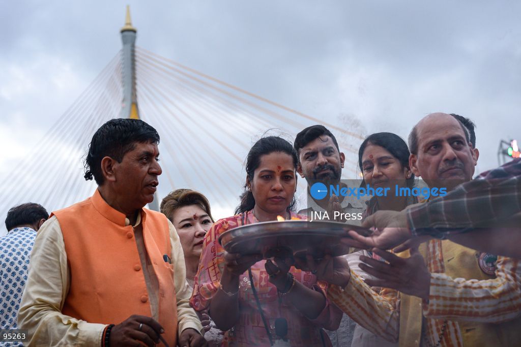BANGKOK, THAILAND, SEPTEMBER 20, 2026: Hindu devotees worship a statue of Lord Ganesha during Ganesh Chaturthi celebrations near Bhumibol Bridge in Bangkok. The Hindu festival honors Ganesha, the deity associated with wisdom, prosperity and the removal of obstacles, and is observed with prayers, offerings and religious ceremonies. Photo by Watsawat Koktabtim / JNA Press. (Photo by Watsawat Koktabtim/JNA Press via Nexpher Images)