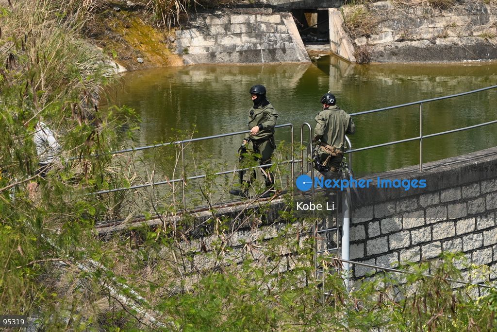 FILE PHOTO - The deployment of "Flying Tigers" (Special Duties Unit) to search the Tseung Kwan O Chinese Permanent Cemetery on February 25, 2023 in Hong Kong. The trial of the former husband and in-laws of slain Hong Kong socialite Abby Choi, whose severed head was found in a soup pot in 2023. (Photo by Kobe Li/Nexpher Images)
