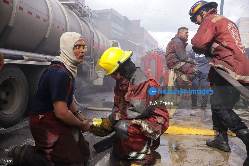 CARACAS, VENEZUELA, SEPTEMBER 20, 2026: Firefighters work at the scene of a fire that damaged a three-story commercial building housing the Meiliwang textile and footwear store on Avenida Principal de El Cementerio in Caracas’ Libertador municipality. Caracas firefighters, Civil Protection teams, UCV firefighters and municipal emergency personnel responded to extinguish the blaze and carry out cooling operations. No injuries were reported, while authorities are investigating the cause of the fire. Photo by Mario Flores / JNA Press. (Photo by Mario Flores/JNA Press via Nexpher Images)