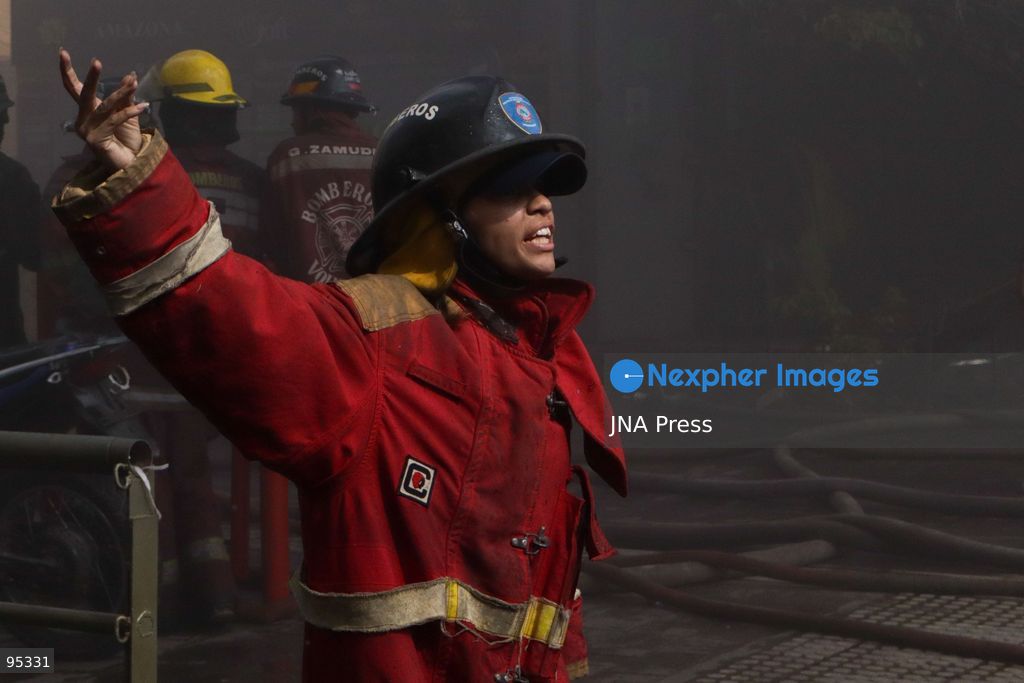 CARACAS, VENEZUELA, SEPTEMBER 20, 2026: Firefighters work at the scene of a fire that damaged a three-story commercial building housing the Meiliwang textile and footwear store on Avenida Principal de El Cementerio in Caracas’ Libertador municipality. Caracas firefighters, Civil Protection teams, UCV firefighters and municipal emergency personnel responded to extinguish the blaze and carry out cooling operations. No injuries were reported, while authorities are investigating the cause of the fire. Photo by Mario Flores / JNA Press. (Photo by Mario Flores/JNA Press via Nexpher Images)