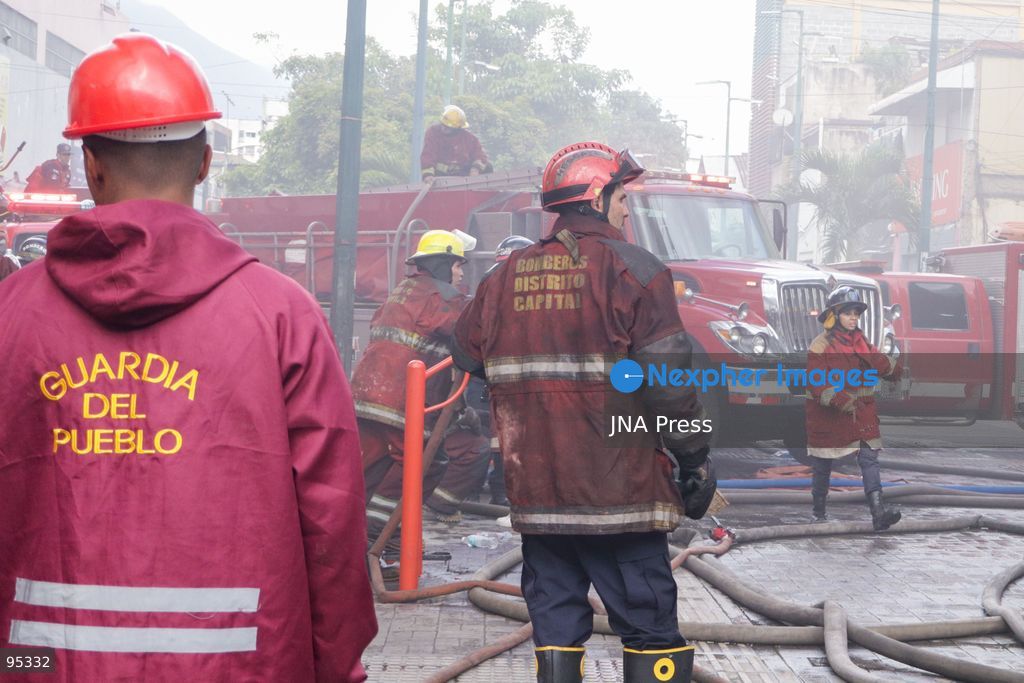 CARACAS, VENEZUELA, SEPTEMBER 20, 2026: Firefighters work at the scene of a fire that damaged a three-story commercial building housing the Meiliwang textile and footwear store on Avenida Principal de El Cementerio in Caracas’ Libertador municipality. Caracas firefighters, Civil Protection teams, UCV firefighters and municipal emergency personnel responded to extinguish the blaze and carry out cooling operations. No injuries were reported, while authorities are investigating the cause of the fire. Photo by Mario Flores / JNA Press. (Photo by Mario Flores/JNA Press via Nexpher Images)