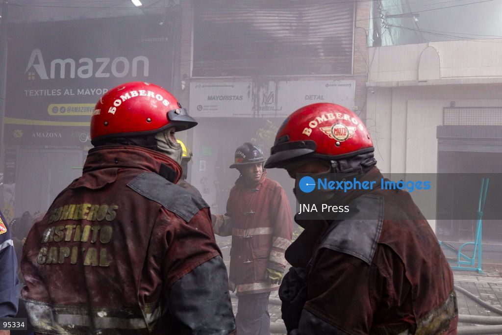 CARACAS, VENEZUELA, SEPTEMBER 20, 2026: Firefighters work at the scene of a fire that damaged a three-story commercial building housing the Meiliwang textile and footwear store on Avenida Principal de El Cementerio in Caracas’ Libertador municipality. Caracas firefighters, Civil Protection teams, UCV firefighters and municipal emergency personnel responded to extinguish the blaze and carry out cooling operations. No injuries were reported, while authorities are investigating the cause of the fire. Photo by Mario Flores / JNA Press. (Photo by Mario Flores/JNA Press via Nexpher Images)
