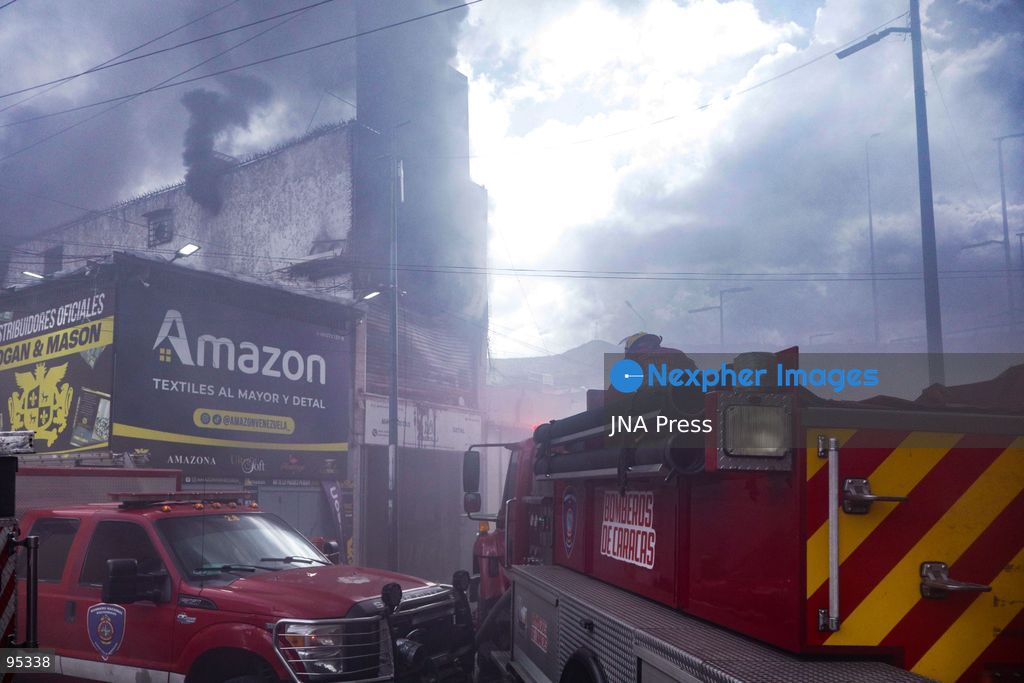 CARACAS, VENEZUELA, SEPTEMBER 20, 2026: Firefighters work at the scene of a fire that damaged a three-story commercial building housing the Meiliwang textile and footwear store on Avenida Principal de El Cementerio in Caracas’ Libertador municipality. Caracas firefighters, Civil Protection teams, UCV firefighters and municipal emergency personnel responded to extinguish the blaze and carry out cooling operations. No injuries were reported, while authorities are investigating the cause of the fire. Photo by Mario Flores / JNA Press. (Photo by Mario Flores/JNA Press via Nexpher Images)