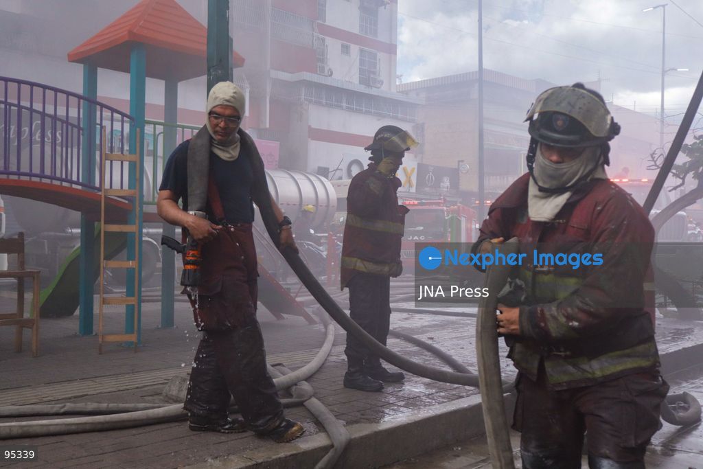 CARACAS, VENEZUELA, SEPTEMBER 20, 2026: Firefighters work at the scene of a fire that damaged a three-story commercial building housing the Meiliwang textile and footwear store on Avenida Principal de El Cementerio in Caracas’ Libertador municipality. Caracas firefighters, Civil Protection teams, UCV firefighters and municipal emergency personnel responded to extinguish the blaze and carry out cooling operations. No injuries were reported, while authorities are investigating the cause of the fire. Photo by Mario Flores / JNA Press. (Photo by Mario Flores/JNA Press via Nexpher Images)