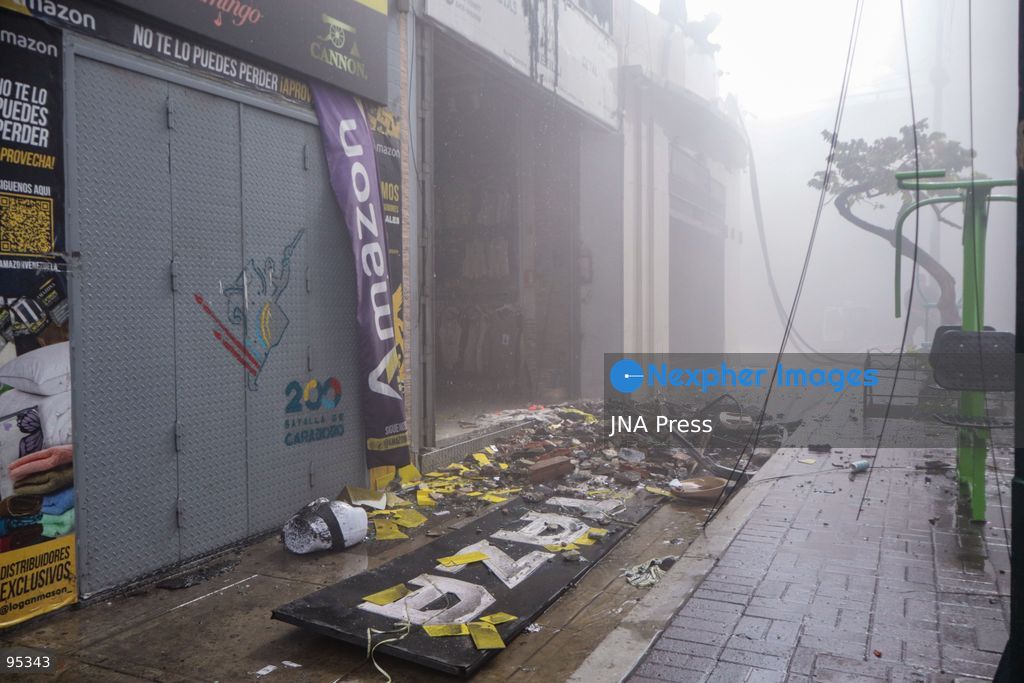 CARACAS, VENEZUELA, SEPTEMBER 20, 2026: Firefighters work at the scene of a fire that damaged a three-story commercial building housing the Meiliwang textile and footwear store on Avenida Principal de El Cementerio in Caracas’ Libertador municipality. Caracas firefighters, Civil Protection teams, UCV firefighters and municipal emergency personnel responded to extinguish the blaze and carry out cooling operations. No injuries were reported, while authorities are investigating the cause of the fire. Photo by Mario Flores / JNA Press. (Photo by Mario Flores/JNA Press via Nexpher Images)
