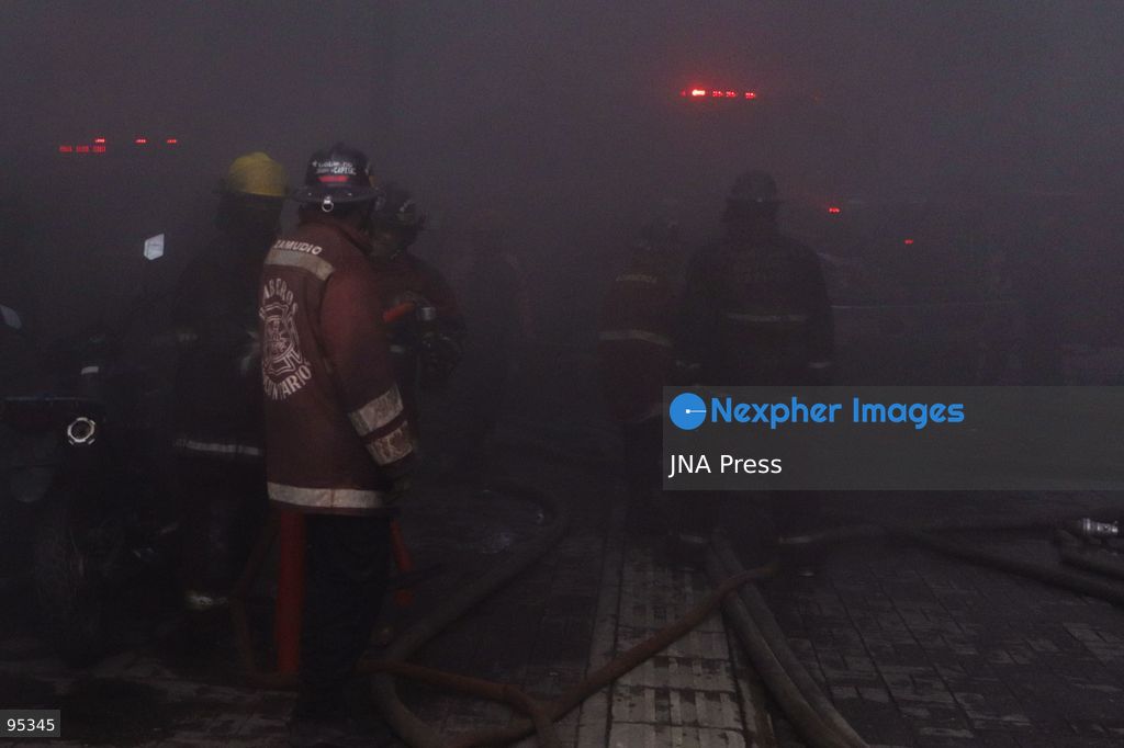 CARACAS, VENEZUELA, SEPTEMBER 20, 2026: Firefighters work at the scene of a fire that damaged a three-story commercial building housing the Meiliwang textile and footwear store on Avenida Principal de El Cementerio in Caracas’ Libertador municipality. Caracas firefighters, Civil Protection teams, UCV firefighters and municipal emergency personnel responded to extinguish the blaze and carry out cooling operations. No injuries were reported, while authorities are investigating the cause of the fire. Photo by Mario Flores / JNA Press. (Photo by Mario Flores/JNA Press via Nexpher Images)