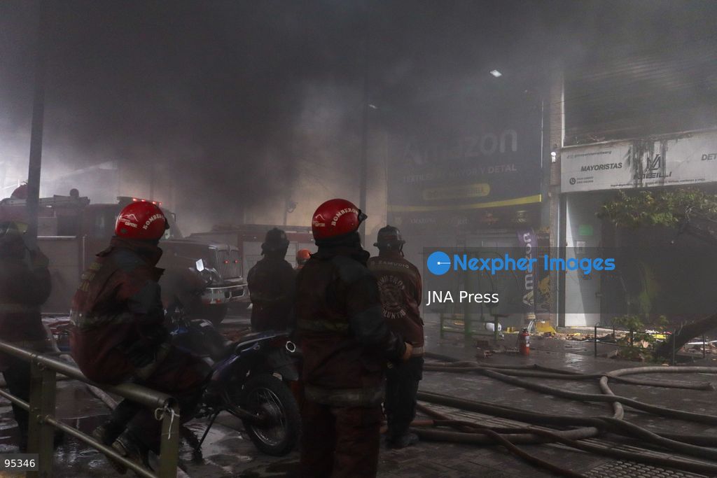 CARACAS, VENEZUELA, SEPTEMBER 20, 2026: Firefighters work at the scene of a fire that damaged a three-story commercial building housing the Meiliwang textile and footwear store on Avenida Principal de El Cementerio in Caracas’ Libertador municipality. Caracas firefighters, Civil Protection teams, UCV firefighters and municipal emergency personnel responded to extinguish the blaze and carry out cooling operations. No injuries were reported, while authorities are investigating the cause of the fire. Photo by Mario Flores / JNA Press. (Photo by Mario Flores/JNA Press via Nexpher Images)