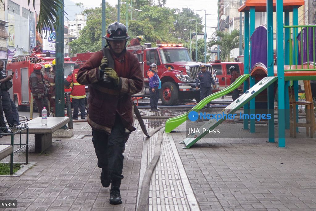 CARACAS, VENEZUELA, SEPTEMBER 20, 2026: Firefighters work at the scene of a fire that damaged a three-story commercial building housing the Meiliwang textile and footwear store on Avenida Principal de El Cementerio in Caracas’ Libertador municipality. Caracas firefighters, Civil Protection teams, UCV firefighters and municipal emergency personnel responded to extinguish the blaze and carry out cooling operations. No injuries were reported, while authorities are investigating the cause of the fire. Photo by Mario Flores / JNA Press. (Photo by Mario Flores/JNA Press via Nexpher Images)