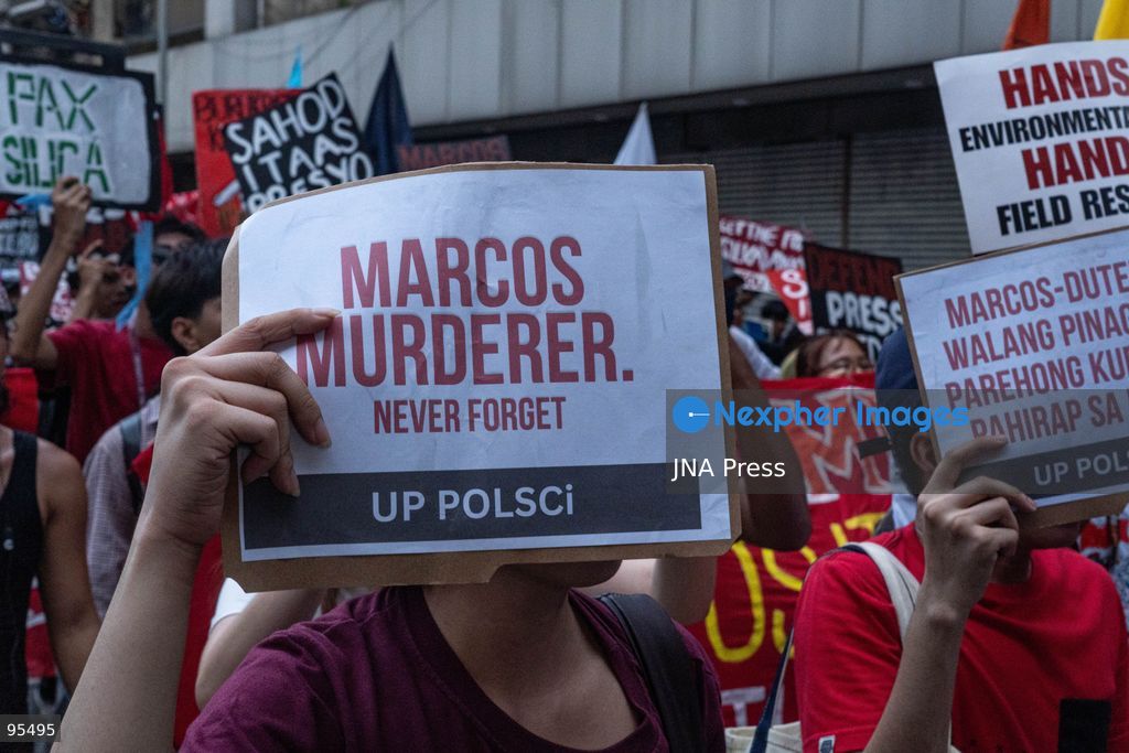 MANILA, PHILIPPINES, SEPTEMBER 21, 2026: Activists and members of progressive groups march through Manila during a demonstration marking the 54th anniversary of the declaration of Martial Law under former President Ferdinand Marcos Sr. The protest began with a program at Liwasang Bonifacio before demonstrators marched toward Mendiola, where police barricades had been deployed. Participants commemorated victims of human rights violations during the Marcos era and called for government accountability over current political and corruption issues. Photo by Charles Edmon / JNA Press. (Photo by Charles Edmon S. Perez/JNA Press via Nexpher Images)