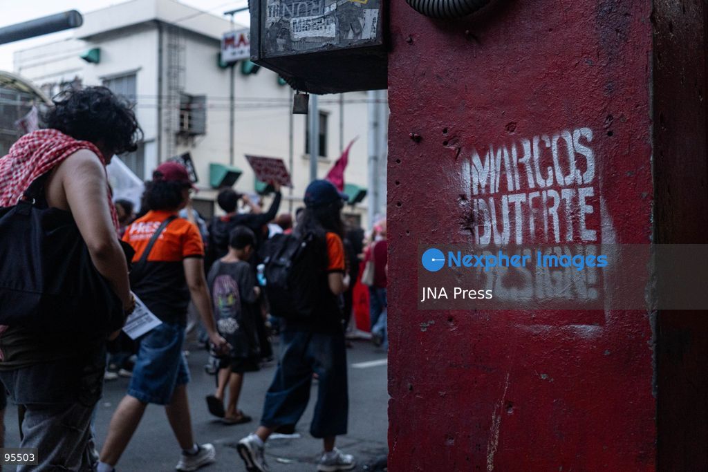 MANILA, PHILIPPINES, SEPTEMBER 21, 2026: Activists and members of progressive groups march through Manila during a demonstration marking the 54th anniversary of the declaration of Martial Law under former President Ferdinand Marcos Sr. The protest began with a program at Liwasang Bonifacio before demonstrators marched toward Mendiola, where police barricades had been deployed. Participants commemorated victims of human rights violations during the Marcos era and called for government accountability over current political and corruption issues. Photo by Charles Edmon / JNA Press. (Photo by Charles Edmon S. Perez/JNA Press via Nexpher Images)