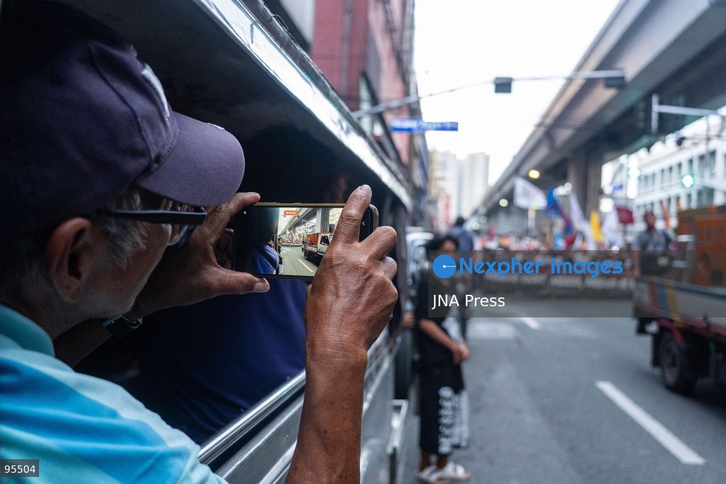 MANILA, PHILIPPINES, SEPTEMBER 21, 2026: Activists and members of progressive groups march through Manila during a demonstration marking the 54th anniversary of the declaration of Martial Law under former President Ferdinand Marcos Sr. The protest began with a program at Liwasang Bonifacio before demonstrators marched toward Mendiola, where police barricades had been deployed. Participants commemorated victims of human rights violations during the Marcos era and called for government accountability over current political and corruption issues. Photo by Charles Edmon / JNA Press. (Photo by Charles Edmon S. Perez/JNA Press via Nexpher Images)