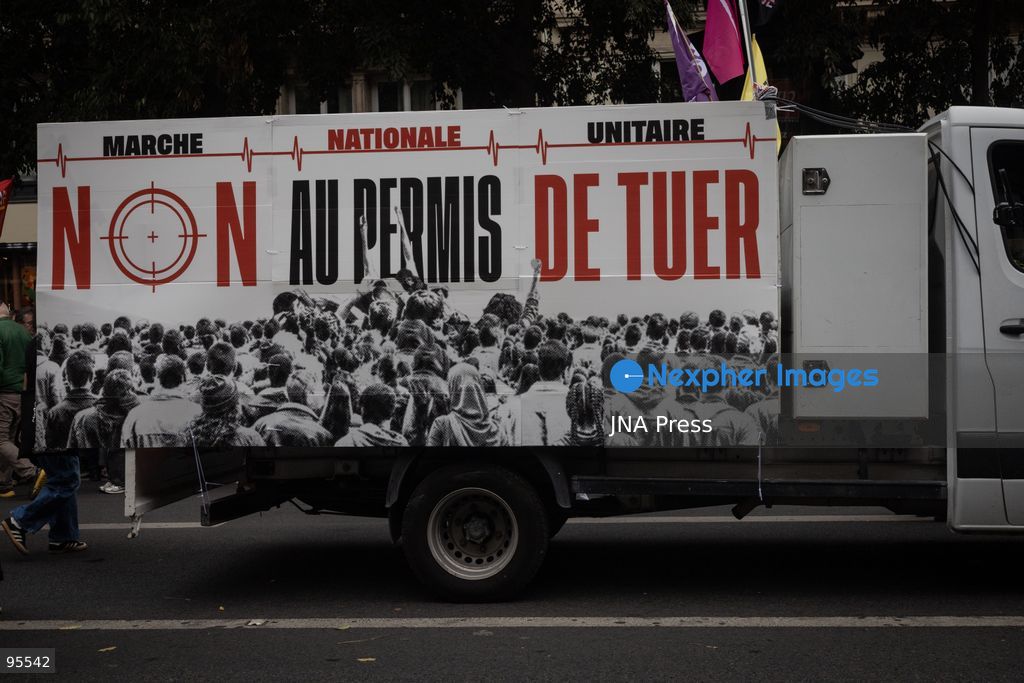 PARIS, FRANCE, SEPTEMBER 20, 2026: Demonstrators gather at Place de la République in Paris during a protest against a proposed law granting police and gendarmes a presumption that their use of firearms complied with legal requirements. Opponents have dubbed the legislation a “licence to kill,” arguing that it could weaken accountability for police shootings. Around 21,000 people joined the Paris demonstration, according to police. Gendarmes used tear gas as tensions escalated during the protest. Photo by Nadia Caimi / JNA Press (Photo by Nadia Caimi/JNA Press via Nexpher Images)