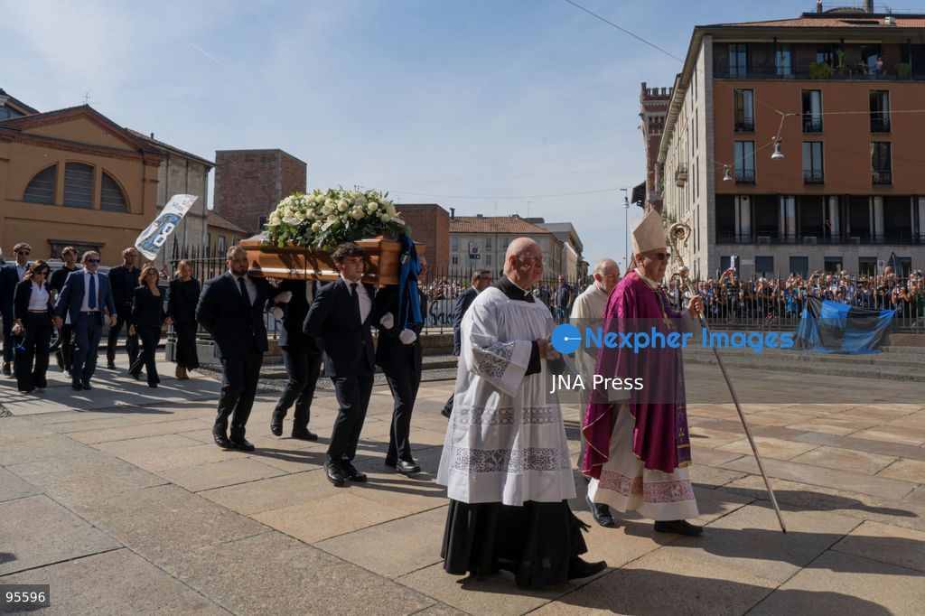 MILAN, ITALY, SEPTEMBER 21, 2026: The coffin of Italian football legend Sandro Mazzola is carried during his funeral at the Basilica of Sant’Ambrogio in Milan. Hundreds of supporters, former Inter players and representatives of Italian football attended the ceremony to pay tribute to Mazzola, who died on September 19 at the age of 83. The former Inter Milan and Italy star spent his entire professional career with Inter, winning four Serie A titles and two European Cups, and was part of Italy’s European Championship-winning team in 1968. Photo by Calogero Russo/ JNA Press. (Photo by calogero russo/JNA Press via Nexpher Images)