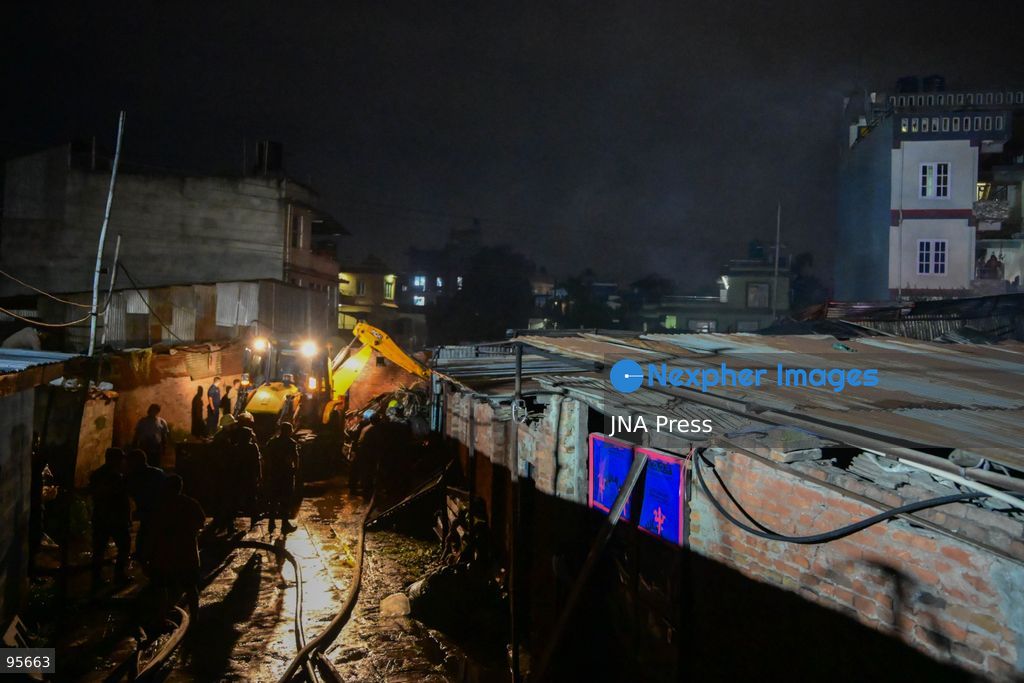 KATHMANDU, NEPAL, SEPTEMBER 21, 2026: Firefighters and security personnel work to extinguish a fire at a plastic warehouse in the Teku area of Kathmandu. Personnel from the Nepal Army, Armed Police Force and Nepal Police joined Kathmandu Metropolitan City firefighters and local residents in efforts to bring the blaze under control near residential buildings and a waste-management centre. The cause of the fire and the extent of the damage were not immediately known. Photo by Safal Shrestha/ JNA Press. (Photo by Safal Prakash Shrestha/JNA Press via Nexpher Images)