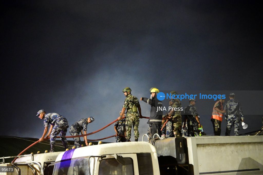 KATHMANDU, NEPAL, SEPTEMBER 21, 2026: Firefighters and security personnel work to extinguish a fire at a plastic warehouse in the Teku area of Kathmandu. Personnel from the Nepal Army, Armed Police Force and Nepal Police joined Kathmandu Metropolitan City firefighters and local residents in efforts to bring the blaze under control near residential buildings and a waste-management centre. The cause of the fire and the extent of the damage were not immediately known. Photo by Safal Shrestha/ JNA Press. (Photo by Safal Prakash Shrestha/JNA Press via Nexpher Images)