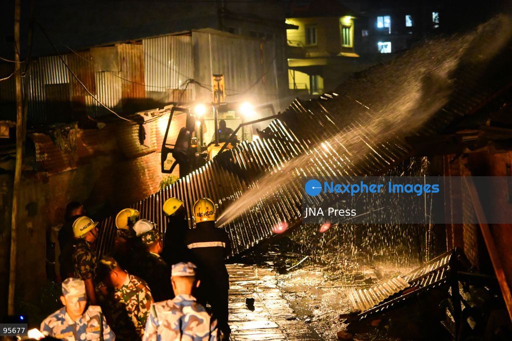 KATHMANDU, NEPAL, SEPTEMBER 21, 2026: Firefighters and security personnel work to extinguish a fire at a plastic warehouse in the Teku area of Kathmandu. Personnel from the Nepal Army, Armed Police Force and Nepal Police joined Kathmandu Metropolitan City firefighters and local residents in efforts to bring the blaze under control near residential buildings and a waste-management centre. The cause of the fire and the extent of the damage were not immediately known. Photo by Safal Shrestha/ JNA Press. (Photo by Safal Prakash Shrestha/JNA Press via Nexpher Images)