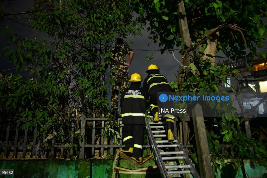 KATHMANDU, NEPAL, SEPTEMBER 21, 2026: Firefighters and security personnel work to extinguish a fire at a plastic warehouse in the Teku area of Kathmandu. Personnel from the Nepal Army, Armed Police Force and Nepal Police joined Kathmandu Metropolitan City firefighters and local residents in efforts to bring the blaze under control near residential buildings and a waste-management centre. The cause of the fire and the extent of the damage were not immediately known. Photo by Safal Shrestha/ JNA Press. (Photo by Safal Prakash Shrestha/JNA Press via Nexpher Images)