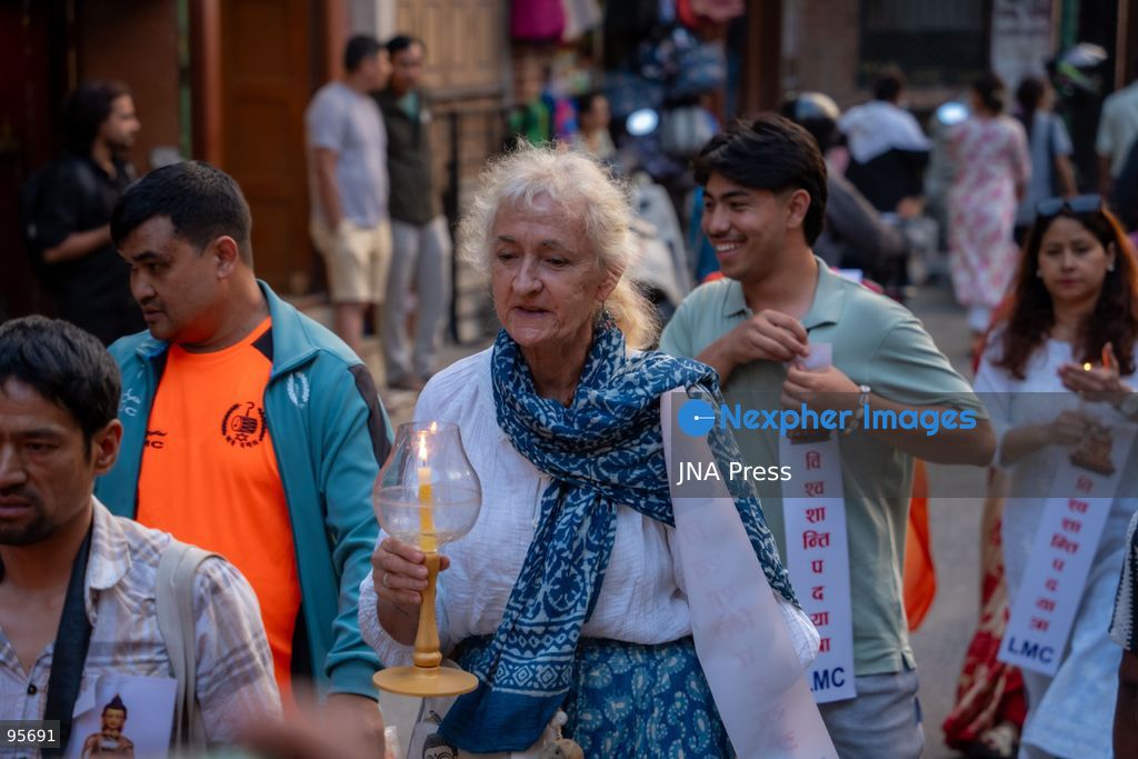 LALITPUR, NEPAL, SEPTEMBER 21, 2026: Participants light traditional lamps at Patan Durbar Square in Lalitpur following a peace walk marking the International Day of Peace. The event was organized by Global Cultural Peace Walk Nepal and Jyapu Samaj Yala, bringing participants together for a symbolic observance promoting peace and solidarity. The International Day of Peace is observed annually on September 21. Photo by Ghanashyam Shrestha / JNA Press. (Photo by Ghanashyam Shrestha/JNA Press via Nexpher Images)