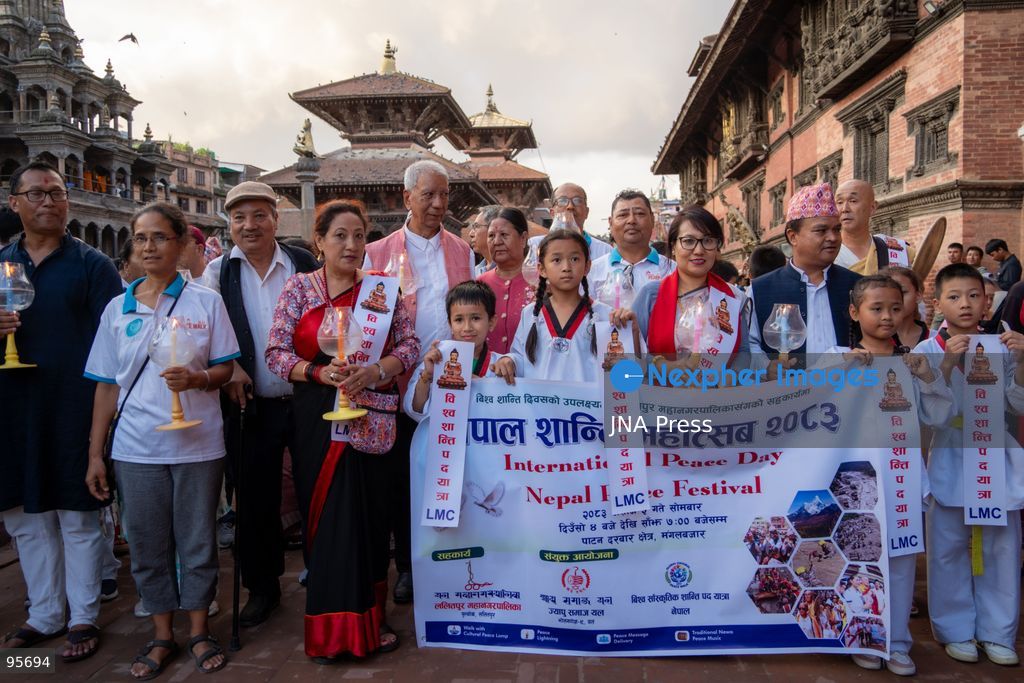 LALITPUR, NEPAL, SEPTEMBER 21, 2026: Participants light traditional lamps at Patan Durbar Square in Lalitpur following a peace walk marking the International Day of Peace. The event was organized by Global Cultural Peace Walk Nepal and Jyapu Samaj Yala, bringing participants together for a symbolic observance promoting peace and solidarity. The International Day of Peace is observed annually on September 21. Photo by Ghanashyam Shrestha / JNA Press. (Photo by Ghanashyam Shrestha/JNA Press via Nexpher Images)