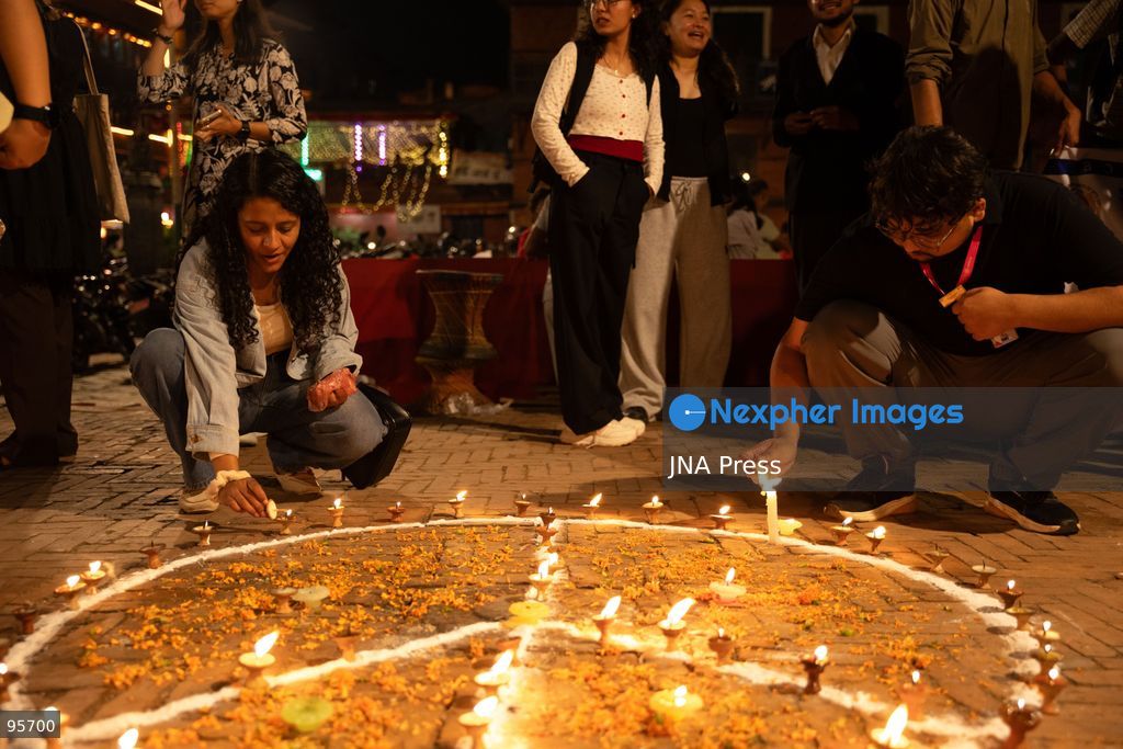 LALITPUR, NEPAL, SEPTEMBER 21, 2026: Participants light traditional lamps at Patan Durbar Square in Lalitpur following a peace walk marking the International Day of Peace. The event was organized by Global Cultural Peace Walk Nepal and Jyapu Samaj Yala, bringing participants together for a symbolic observance promoting peace and solidarity. The International Day of Peace is observed annually on September 21. Photo by Ghanashyam Shrestha / JNA Press. (Photo by Ghanashyam Shrestha/JNA Press via Nexpher Images)