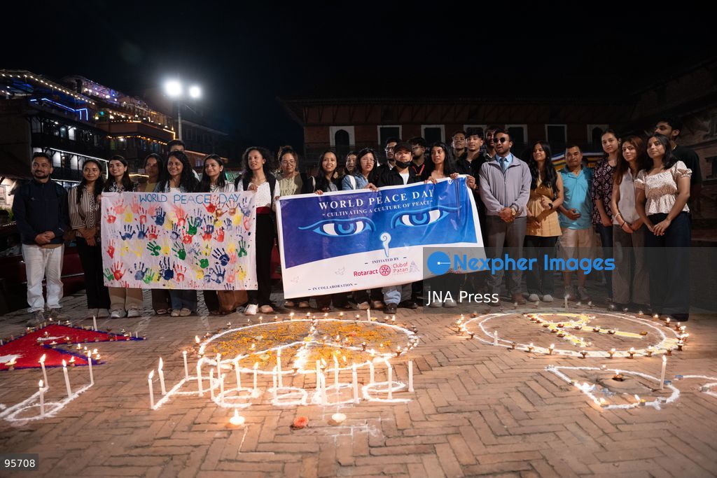 LALITPUR, NEPAL, SEPTEMBER 21, 2026: Participants light traditional lamps at Patan Durbar Square in Lalitpur following a peace walk marking the International Day of Peace. The event was organized by Global Cultural Peace Walk Nepal and Jyapu Samaj Yala, bringing participants together for a symbolic observance promoting peace and solidarity. The International Day of Peace is observed annually on September 21. Photo by Ghanashyam Shrestha / JNA Press. (Photo by Ghanashyam Shrestha/JNA Press via Nexpher Images)