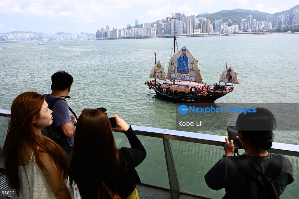 Visitors watching Sik Sik Yuen Wong Tai Sin Temple and the Dukling boat for a special maritime parade in Victoria Harbour on September 23, 2026 in Hong Kong. (Photo by Kobe Li/Nexpher Images)