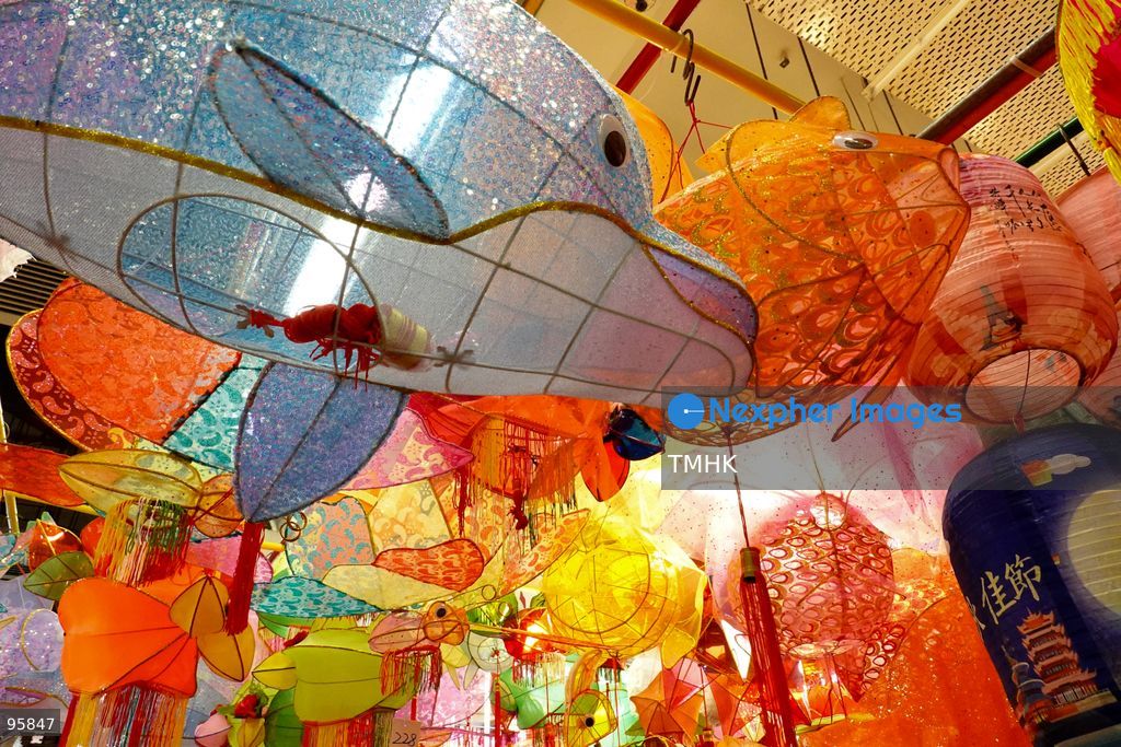 A colourful array of traditional paper lanterns and classic plastic inflatable lanterns hang across a neighbourhood shop on September 22, 2026 in Hong Kong, offering nostalgic festive staples to local residents ahead of the upcoming Mid-Autumn Festival. (Photo by Zulu Lo/TMHK via Nexpher Images)