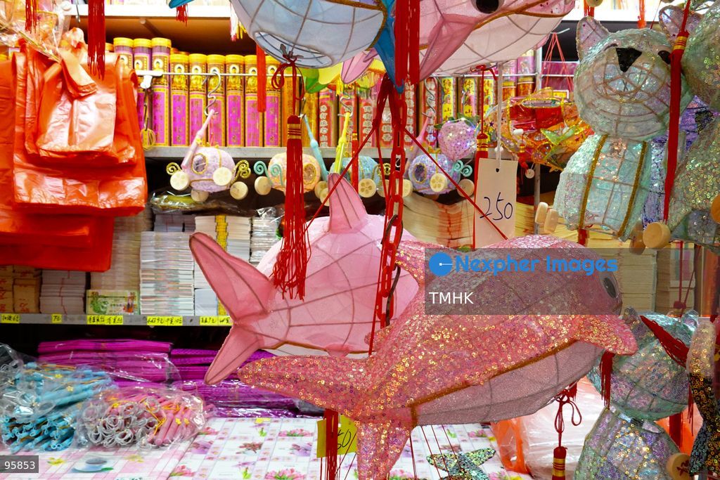 A colourful array of traditional paper lanterns and classic plastic inflatable lanterns hang across a neighbourhood shop on September 22, 2026 in Hong Kong, offering nostalgic festive staples to local residents ahead of the upcoming Mid-Autumn Festival. (Photo by Zulu Lo/TMHK via Nexpher Images)