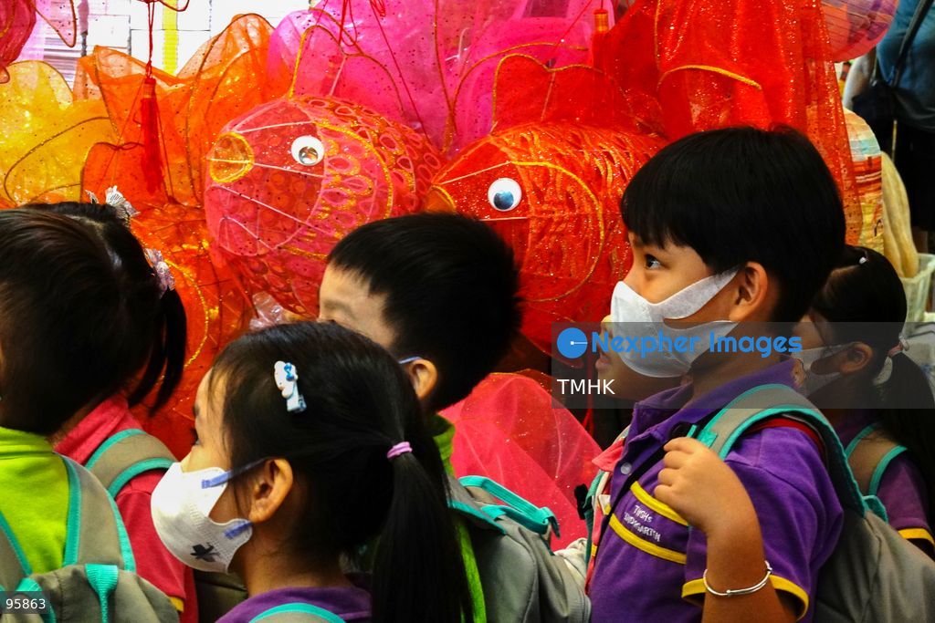 Children look up in delight at a ceiling filled with traditional handmade paper lanterns and colourful plastic lanterns during a visit to an old shop on September 22, 2026 in Hong Kong, discovering classic festive customs ahead of the Mid-Autumn Festival. (Photo by Zulu Lo/TMHK via Nexpher Images)