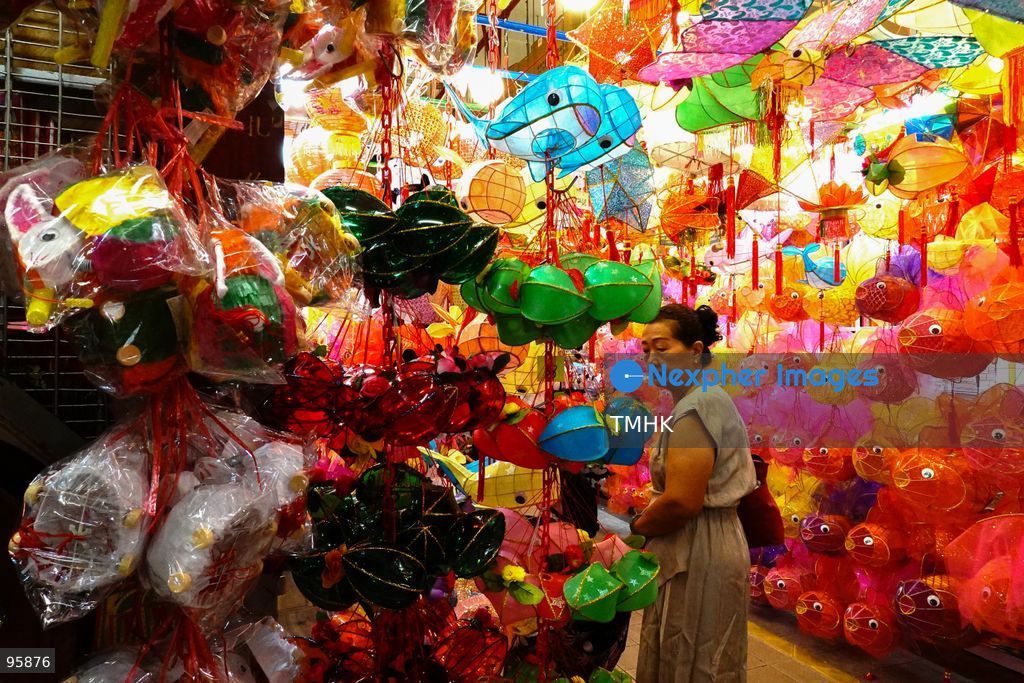 Residents browse and choose from rows of handmade paper lanterns and nostalgic plastic lanterns inside a traditional shop on September 22, 2026 in Hong Kong, preparing for family gatherings and festive celebrations ahead of the Mid-Autumn Festival. (Photo by Zulu Lo/TMHK via Nexpher Images)
