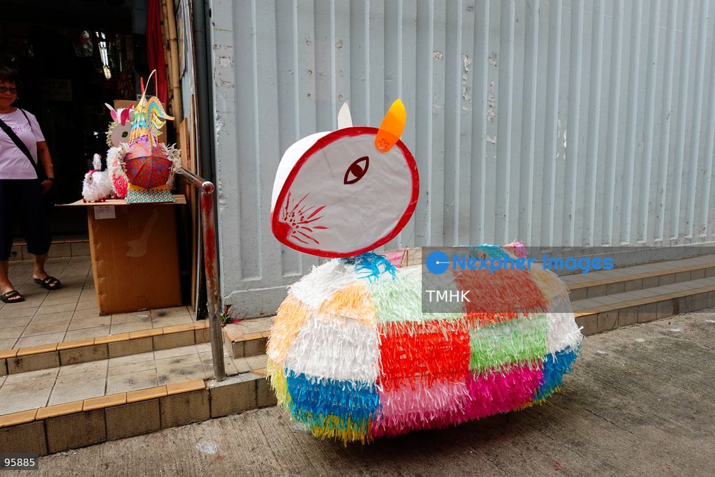 A colourful array of traditional paper lanterns and classic plastic inflatable lanterns hang across a neighbourhood shop on September 22, 2026 in Hong Kong, offering nostalgic festive staples to local residents ahead of the upcoming Mid-Autumn Festival. (Photo by Zulu Lo/TMHK via Nexpher Images)