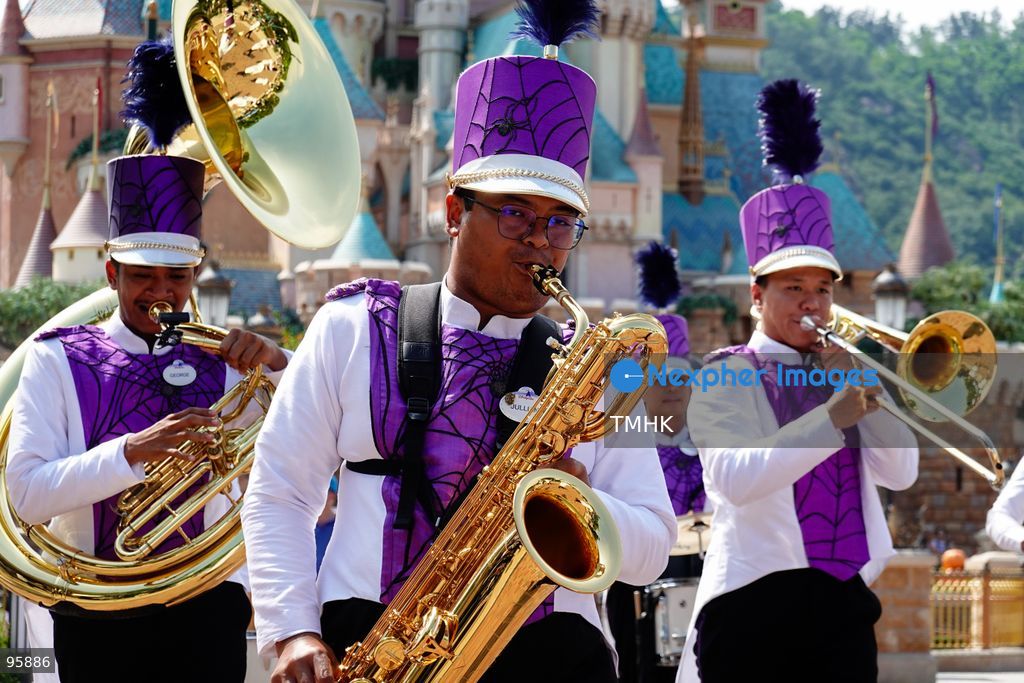 Performers and Disney characters parade along Main Street, U.S.A. during "Mickey's Halloween Time Street Party" as part of the "Disney Halloween Time" seasonal celebrations at Hong Kong Disneyland on September 20, 2026 in Hong Kong. The event runs from September 18 to November 1 across the resort. (Photo by Zulu Lo/TMHK via Nexpher Images)