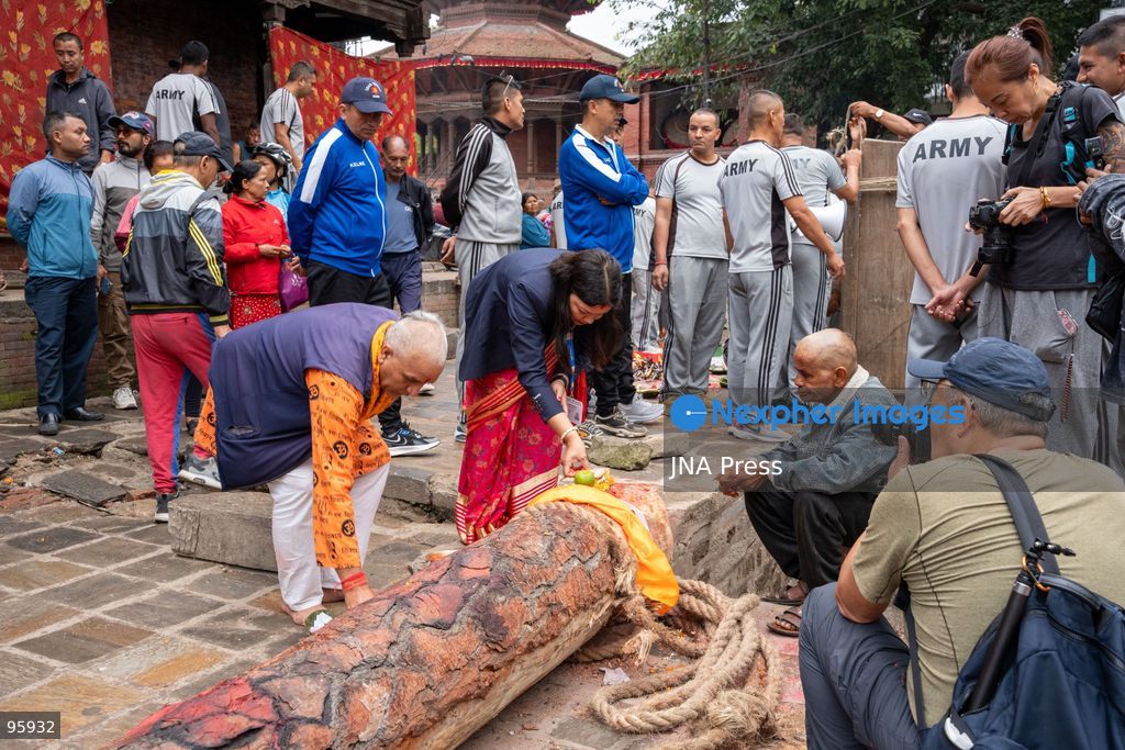 KATHMANDU, NEPAL, SEPTEMBER 23, 2026: Participants raise the ceremonial Indra Dhwaja, or flagpole, in front of Hanuman Dhoka at Basantapur in Kathmandu, formally marking the beginning of the annual Indra Jatra festival. The eight-day religious and cultural festival features traditional rituals, masked dances, chariot processions and worship of Hindu deities, and is one of the major annual celebrations of the Kathmandu Valley. Photo by Ghanashyam Shrestha / JNA Press. (Photo by Ghanashyam Shrestha/JNA Press via Nexpher Images)