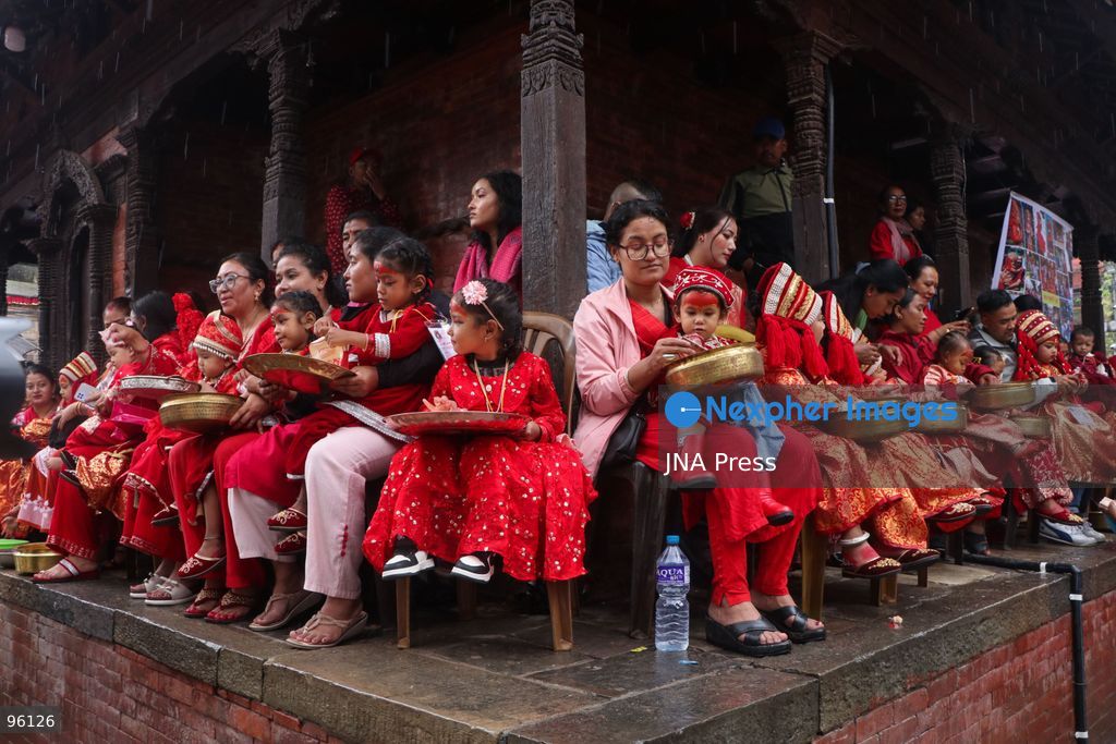 KATHMANDU, NEPAL, SEPTEMBER 24, 2026: Young girls dressed as Kumaris take part in a collective Kumari Puja in front of the Taleju Bhawani Temple at Hanuman Dhoka Durbar Square in Kathmandu during the ongoing Indra Jatra festival. Hundreds of pre-pubescent girls participated in the traditional ceremony, during which they are worshipped as representations of the Kumari, or living goddess. The ritual is traditionally held following the ceremonial raising of the Indra Dhwaja that marks the beginning of the eight-day Indra Jatra festival. Photo by Shankar Bhujel / JNA Press. (Photo by Shankar Bhujel/JNA Press via Nexpher Images)