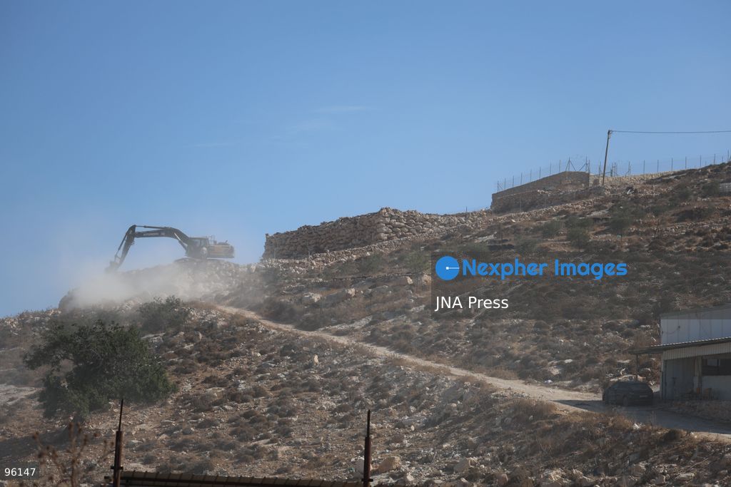 DURA, HEBRON, OCCUPIED WEST BANK, SEPTEMBER 24, 2026: Israeli forces use heavy machinery to bulldoze agricultural land in the Hamseh area near Dura, south of Hebron. The operation caused damage to farmland as Israeli forces continued earthworks in the area. Hamseh has been subjected to repeated bulldozing and demolition operations in recent weeks. Photo by Mosab Shawer / JNA Press. (Photo by Mosab shawer/JNA Press via Nexpher Images)